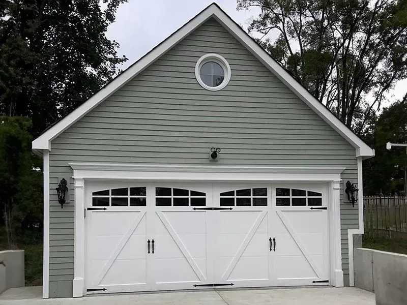 2-car-detached-two-car-garage-upper-window-round